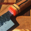 Cuchillo Takobiki artesanal acabado Kurouchi con caja de madera.